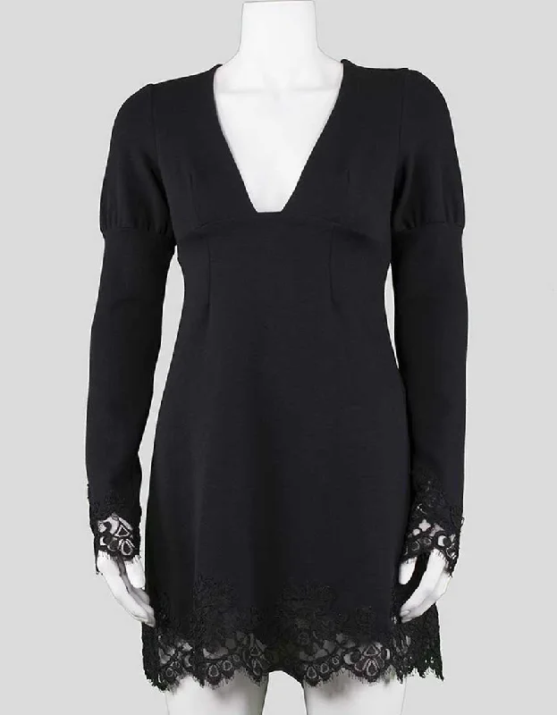 Ingwa Melero Deep V Long Sleeve To The Knee Mini Dress With Lace At Cuffs And Hem Size Small Elegant Lace-Up Mini Dress