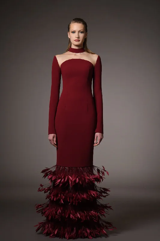 Crepe dress with feathers on the hem